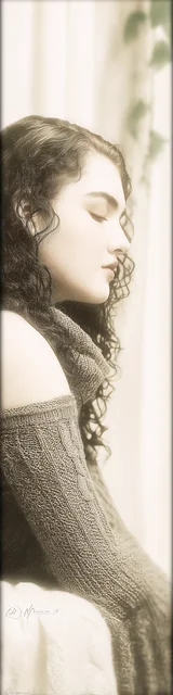 Free aesthetic bookmark featuring a woman with curly hair alone